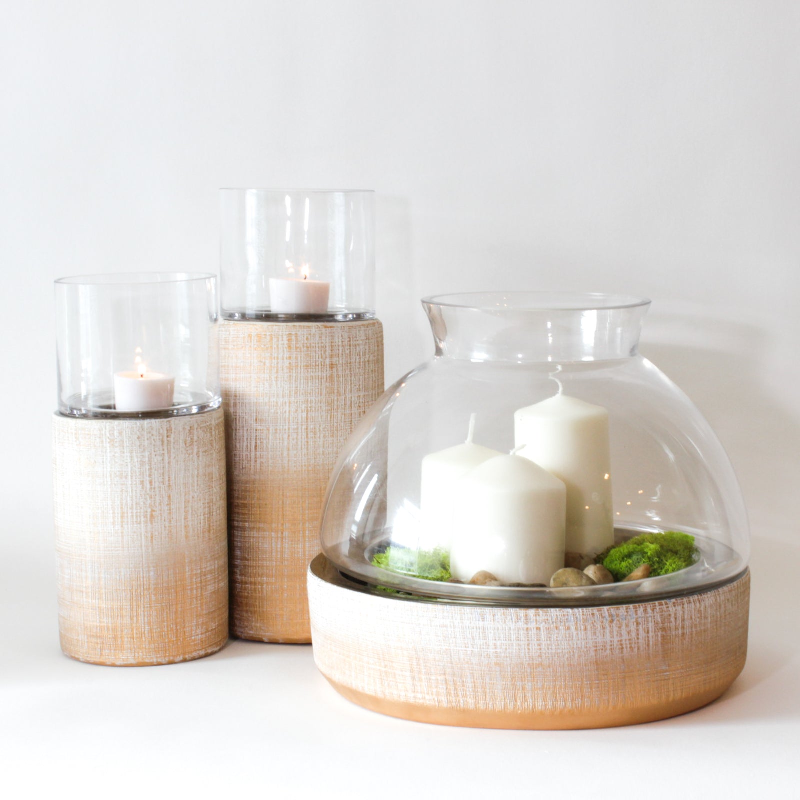 Large ceramic stoneware Candleholder pairs with Cylindrical candleholders for a modern look